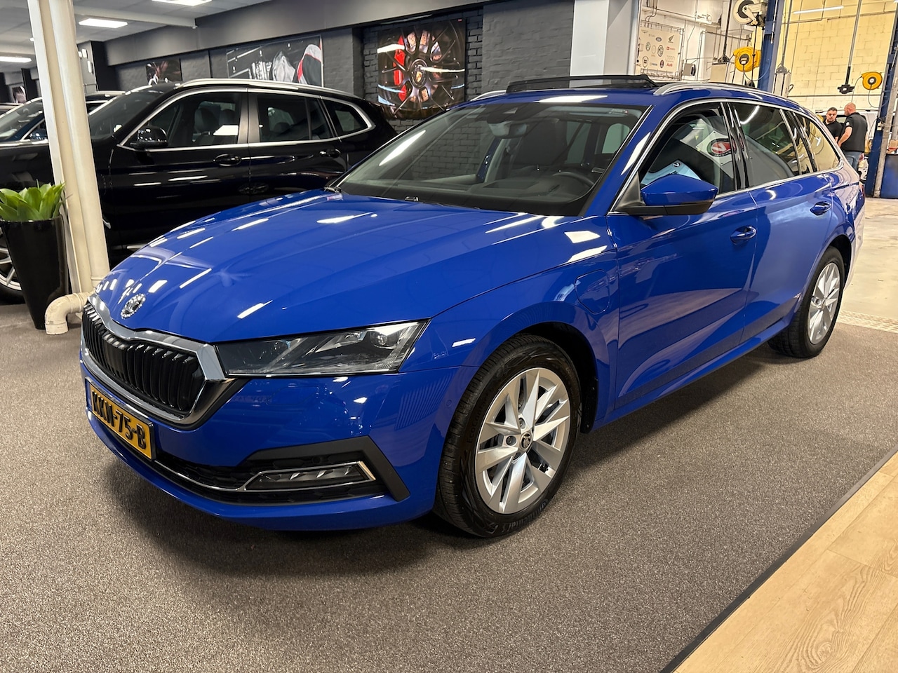 Skoda Octavia Combi - 1.4 TSI iV PHEV style Business / panoramadak / stoel + stuur verwarming / - AutoWereld.nl