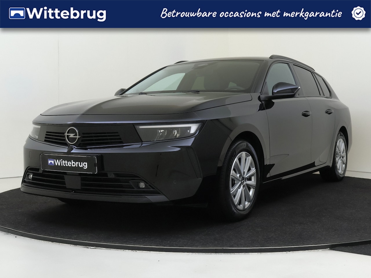 Opel Astra Sports Tourer - 1.2 Turbo 110PK Business Edition Keyless | Apple Carplay | Parkeerhulp | Camera | Navigati - AutoWereld.nl