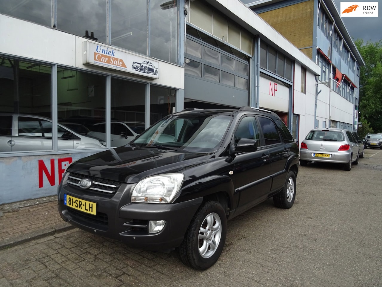 Kia Sportage - 2.0 CVVT Executive 2.0 CVVT Executive - AutoWereld.nl