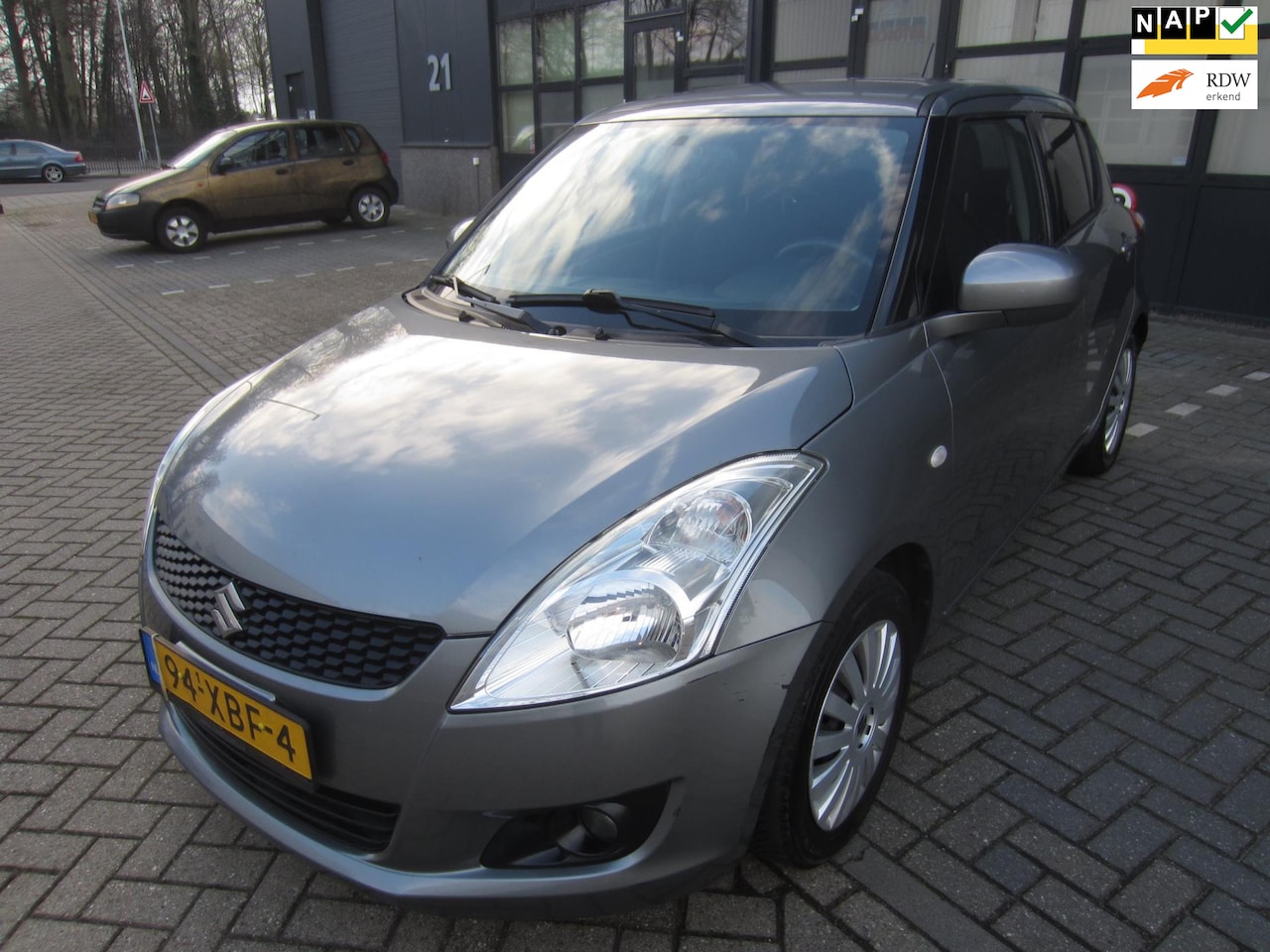 Suzuki Swift - 1.2 Exclusive EASSS 2012 Airco Cruise 5-Deurs NAP! APK! - AutoWereld.nl