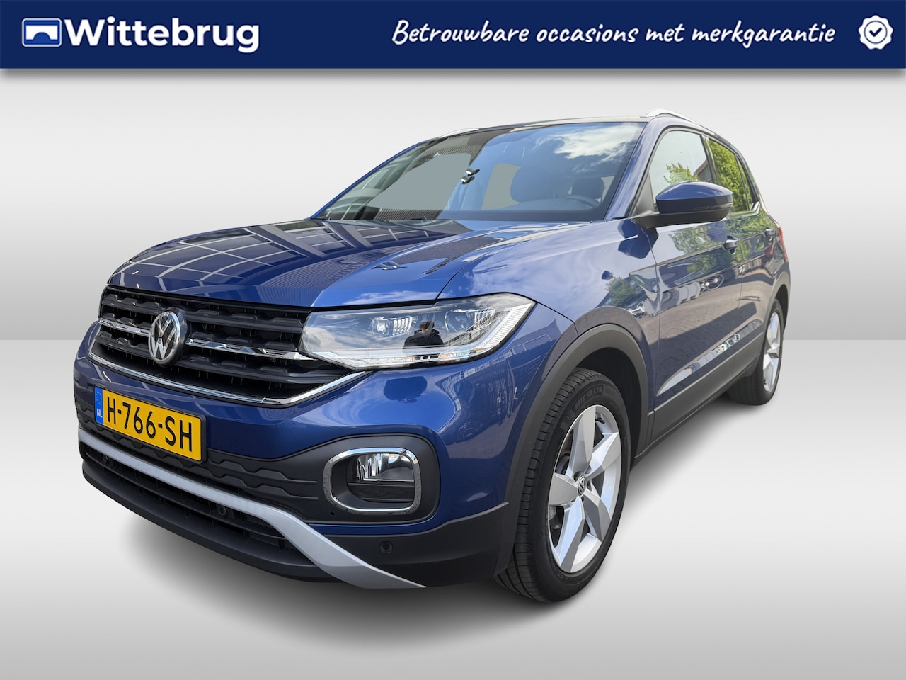 Volkswagen T-Cross - 1.0 TSI Style Executive Multimedia Parkeersensoren / Navigatie / 17"LM velgen / Clima / Le - AutoWereld.nl