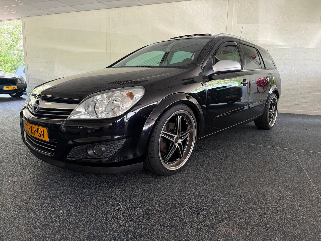 Opel Astra Wagon - 1.8 Essentia | Recaro | Panoramadak | Dab+ | Carplay | Trekhaak | - AutoWereld.nl