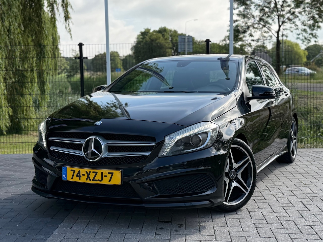 Mercedes-Benz A-klasse - 180 Ambition AMG AUT / AIRCO / CRUISE / PDC - AutoWereld.nl