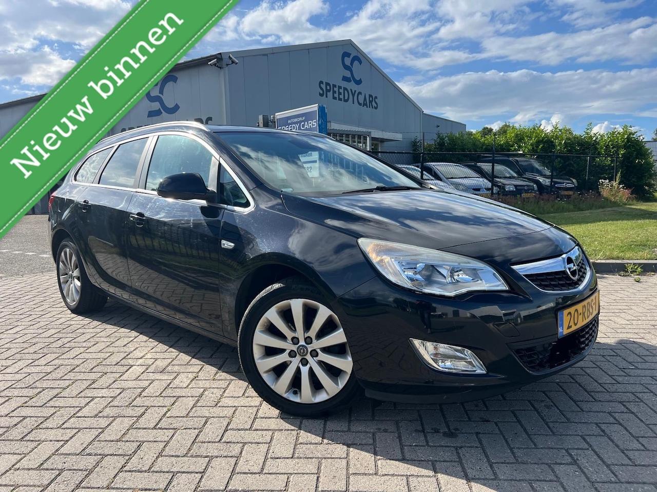 Opel Astra Sports Tourer - 1.4 Cosmo 2011 Leer Cruise Clima - AutoWereld.nl