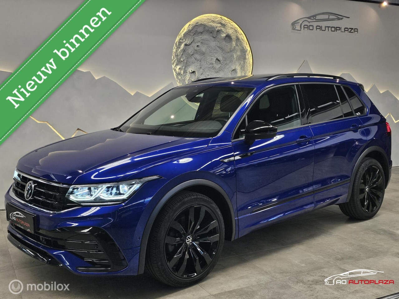 Volkswagen Tiguan - 2.0 TSI 4Motion 3x R-Line Panoramadak/Trekhaak/Lapiz Blue - AutoWereld.nl