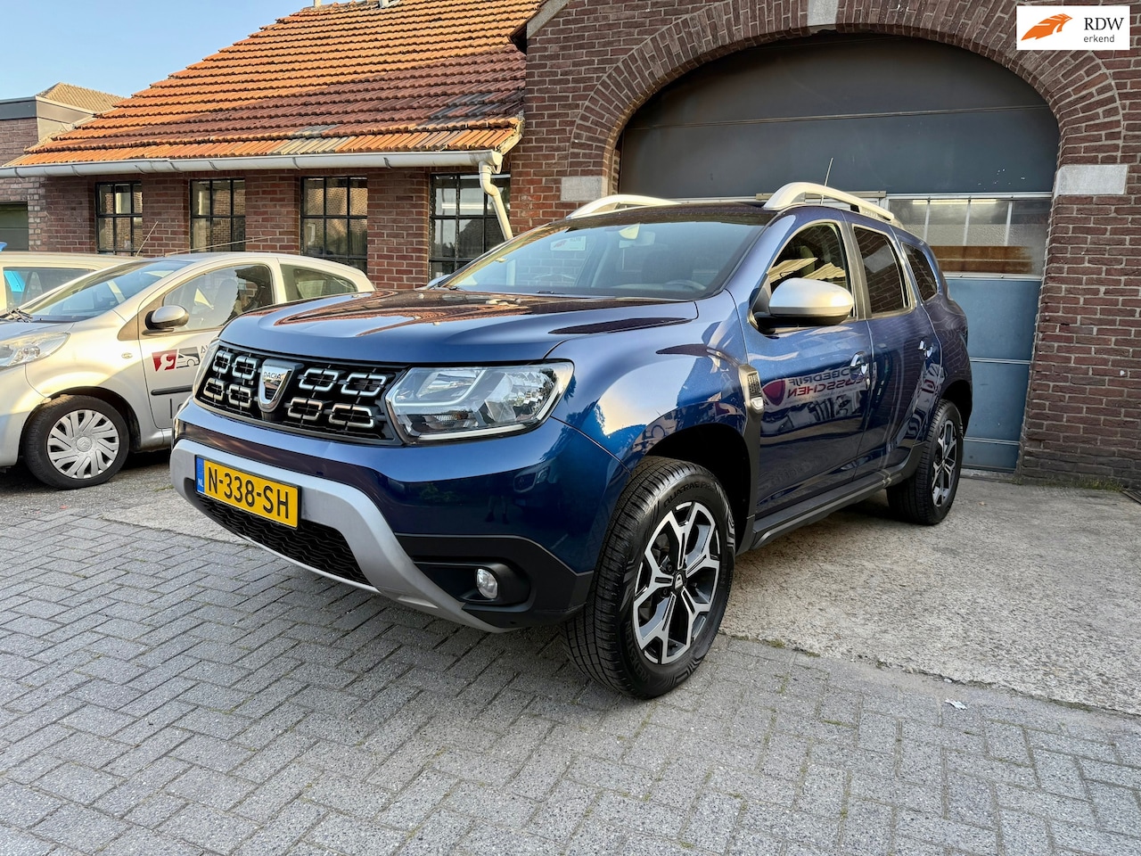 Dacia Duster - 1.6 SCe Essential LPG I CLIMA I CRUISE I CAMERA I NAVI - AutoWereld.nl