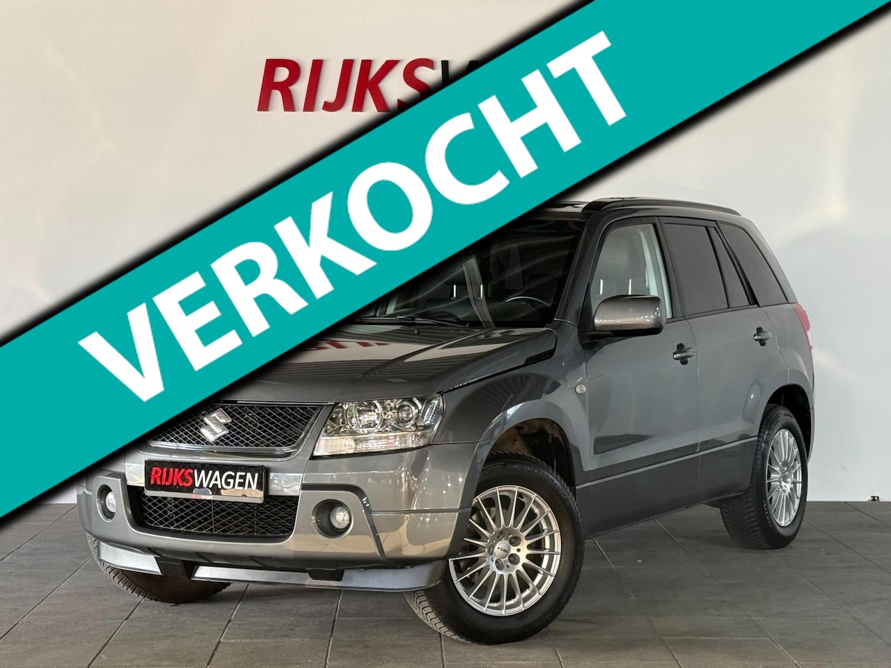 Suzuki Grand Vitara - 2.0-16V High Executive Automaat/Keyless/Schuifdak - AutoWereld.nl