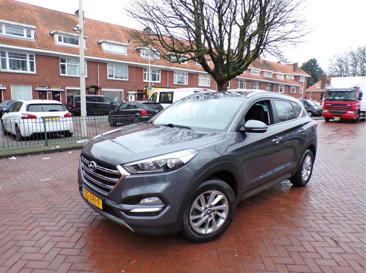 Hyundai Tucson - 1.6 GDi Comfort NAVI TEL CRUISECONT TREKHAAK STOELVERWRM - AutoWereld.nl