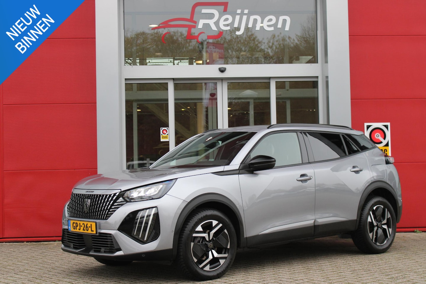 Peugeot 2008 - 1.2 100PK ALLURE | TREKHAAK | CAMERA VOOR + ACHTER | NAVIGATIE | DRAADLOZE APPLE CARPLAY/A - AutoWereld.nl