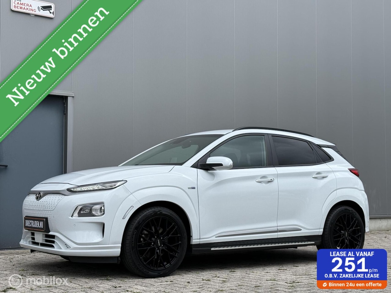 Hyundai Kona Electric - EV Premium 64 kWh - luxe uitvoering - SOH 90% - AutoWereld.nl