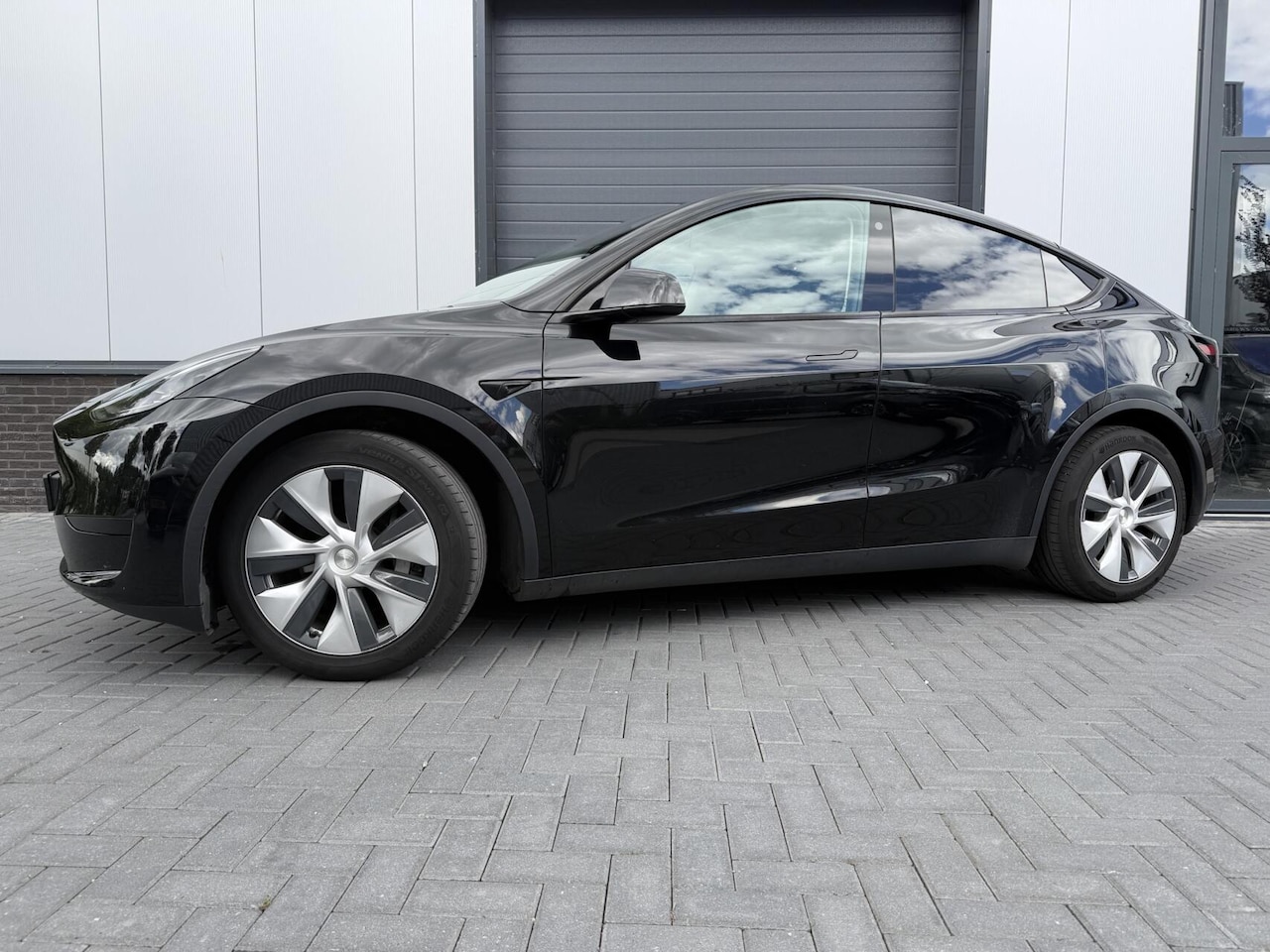 Tesla Model Y - RWD 58 kWh SoH 91% - AutoWereld.nl