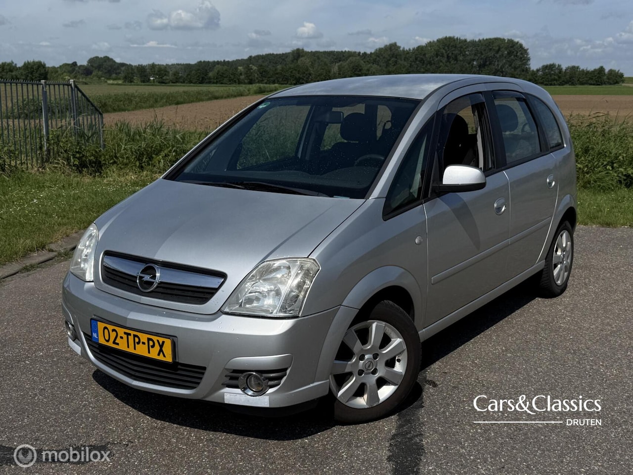 Opel Meriva - 1.6-16V Cosmo | AIRCO | APK 03-2027 | TREKHAAK - AutoWereld.nl