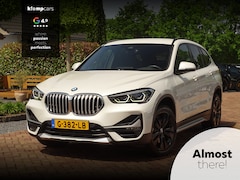 BMW X1 - sDrive20i ParelWeiss | Full Options | HUD | NavPro | Stoelverw | All wheater | Uniek