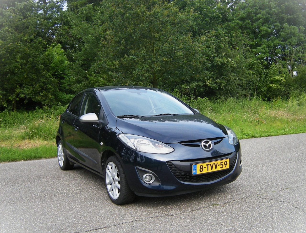 Mazda 2 - 1.3 TS Plus . 5 Drs . Airco . Stoelverwarming . Navigatie . Elec ramen . enz - AutoWereld.nl