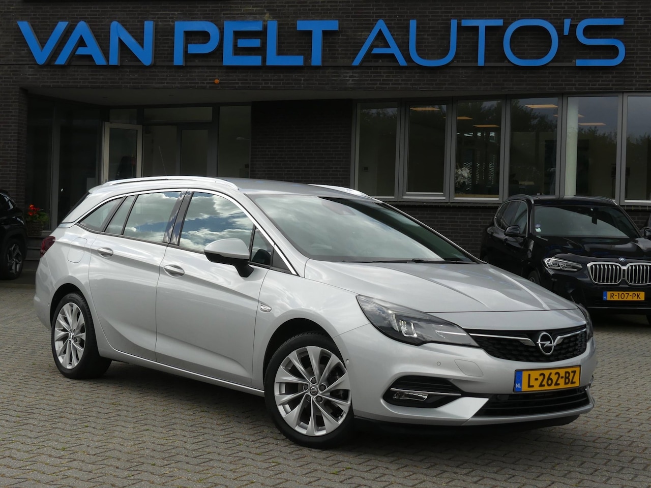 Opel Astra Sports Tourer - 1.2 Elegance / Camera / Carplay - AutoWereld.nl