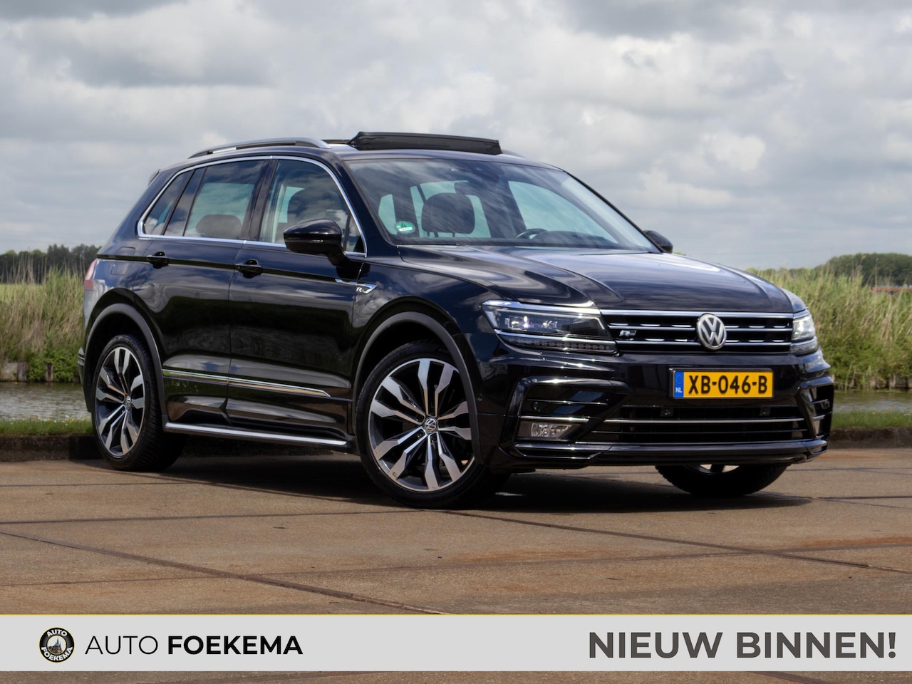 Volkswagen Tiguan - 2.0 TSI 4Motion Highline Pano LED 20" ACC - AutoWereld.nl