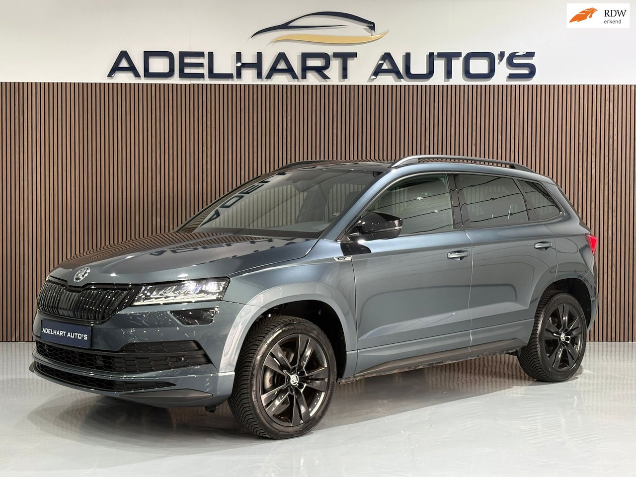 Skoda Karoq - 1.5 TSI ACT Sportline Business Automaat DSG / Navigatie full map / Camera / Adaptive Cruis - AutoWereld.nl