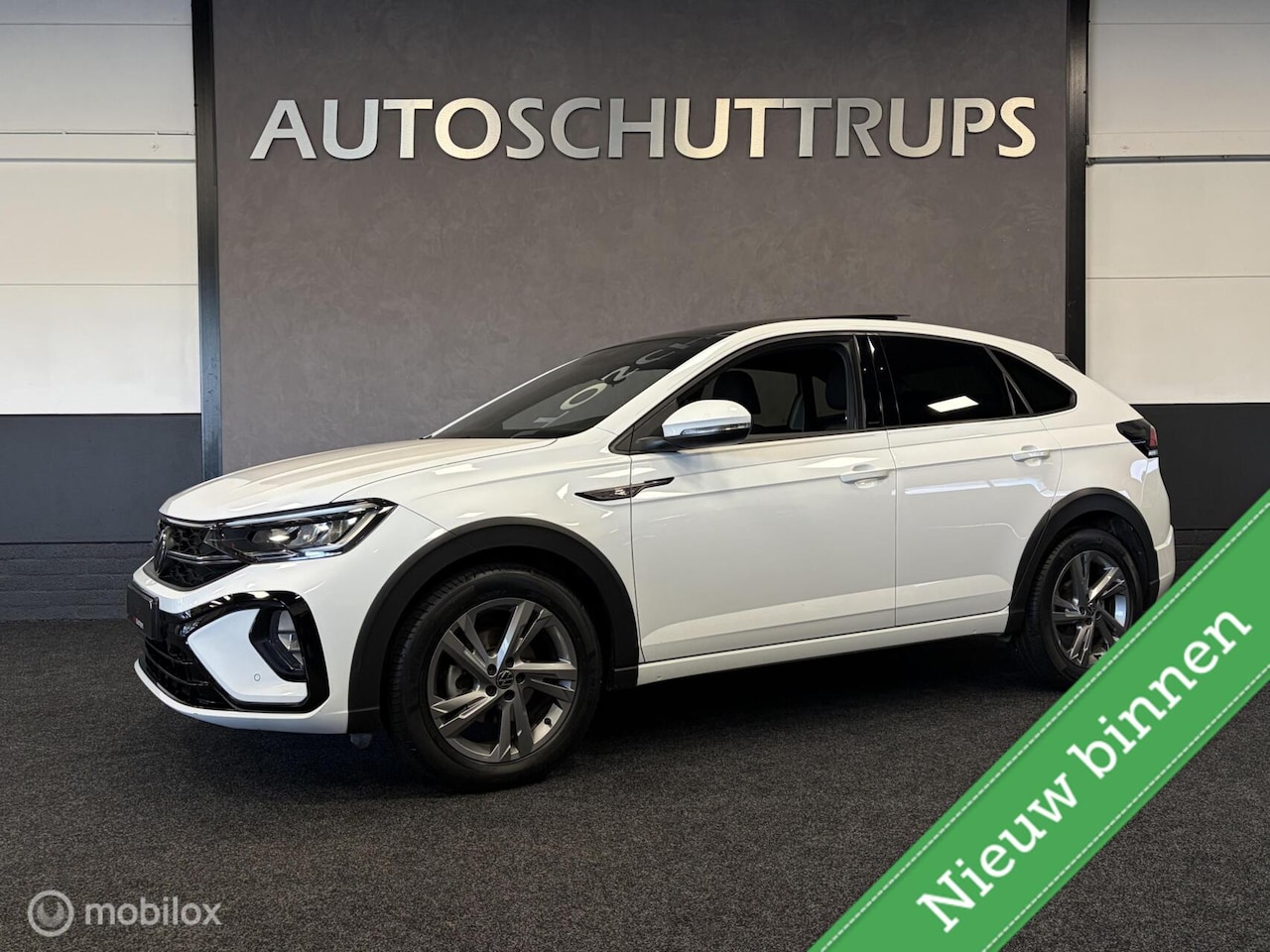Volkswagen Taigo - 1.0 TSI R-Line LED / DIGI DASH / AIRCO / CRUISE / R-LINE / CARPLAY MEDIA / - AutoWereld.nl