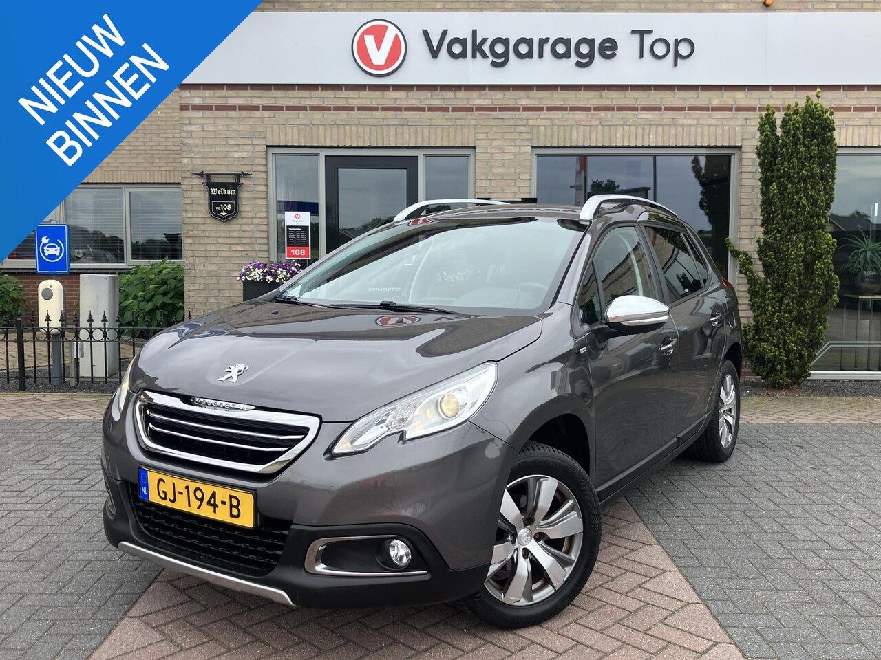 Peugeot 2008 - 1.2 PureTech Style | Automaat | Trekhaak | Navi - AutoWereld.nl