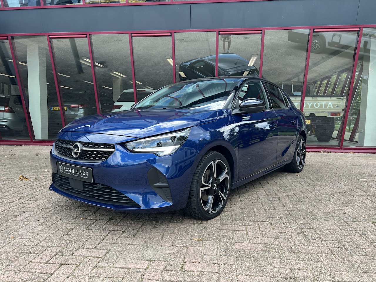 Opel Corsa - 1.2 Elegance | Cruise Control | PDC | Airco | Camera | Stoelverw. | - AutoWereld.nl
