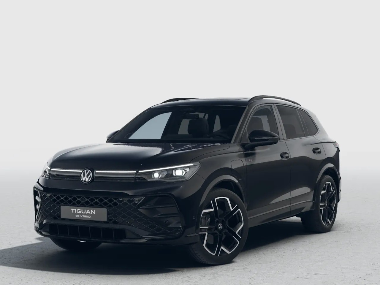 Volkswagen Tiguan - 1.5 eHybrid R-Line Edition 272 pk | Trekhaak | Panorama | Lederen Bekleding | Black Style - AutoWereld.nl