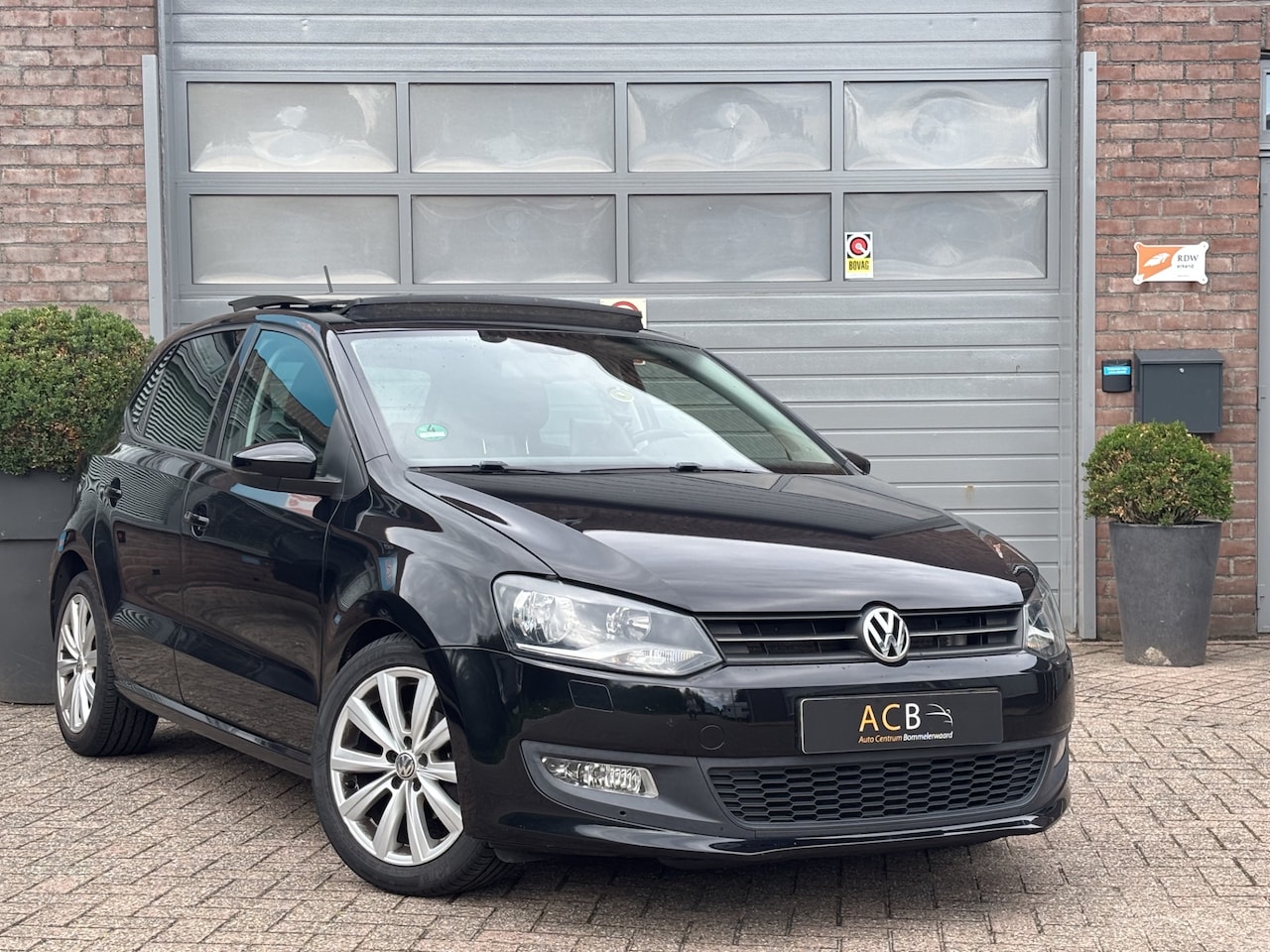Volkswagen Polo - 1.2 TSI Highline Automaat Panoramadak / Stoelverwarming. - AutoWereld.nl