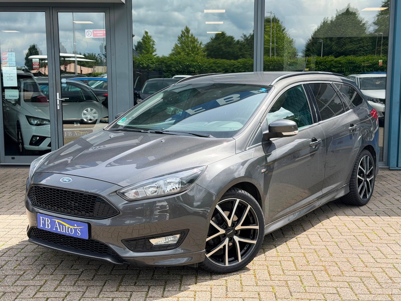 Ford Focus Wagon - 1.0 EcoBoost ST Line Airco Lmv Carplay - AutoWereld.nl