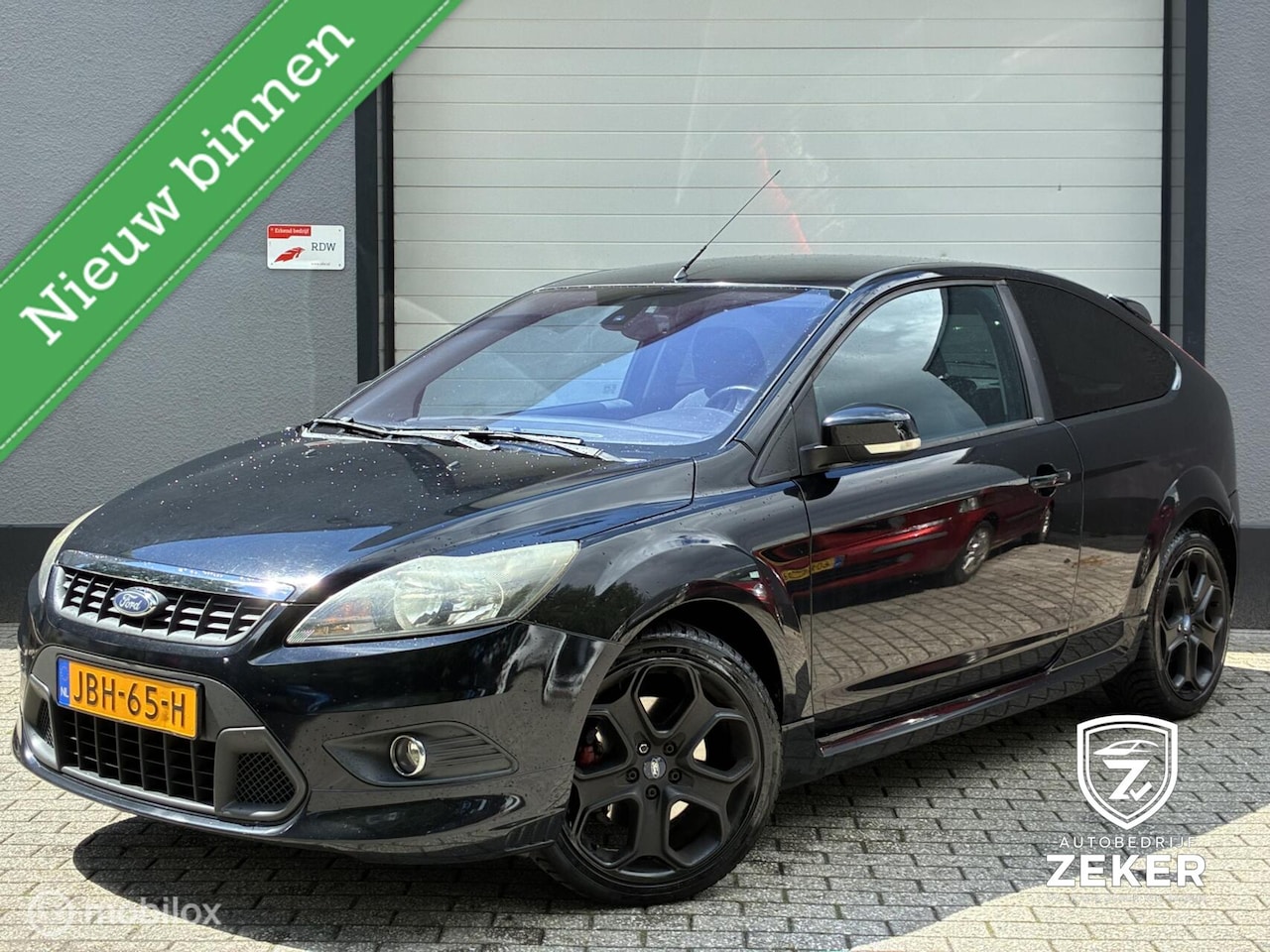 Ford Focus - 2.0 Titanium airco/cruise control/stoelverwarming - AutoWereld.nl