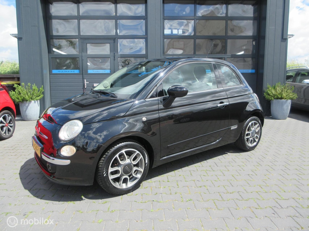 Fiat 500 - 1.2 Lounge 78dkm! 1ste Eig NL auto Airco Bluetooth - AutoWereld.nl