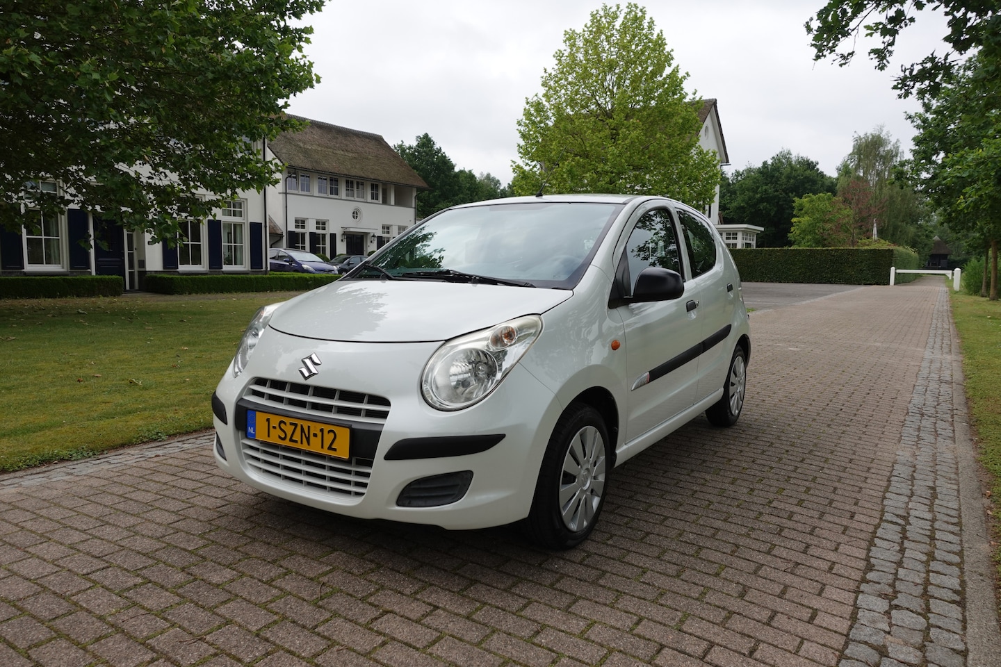 Suzuki Alto - 1.0 Comfort EASSS | Trekhaak | Airco | LAGE KM | Dealer onderhouden | BOVAG GARANTIE | - AutoWereld.nl