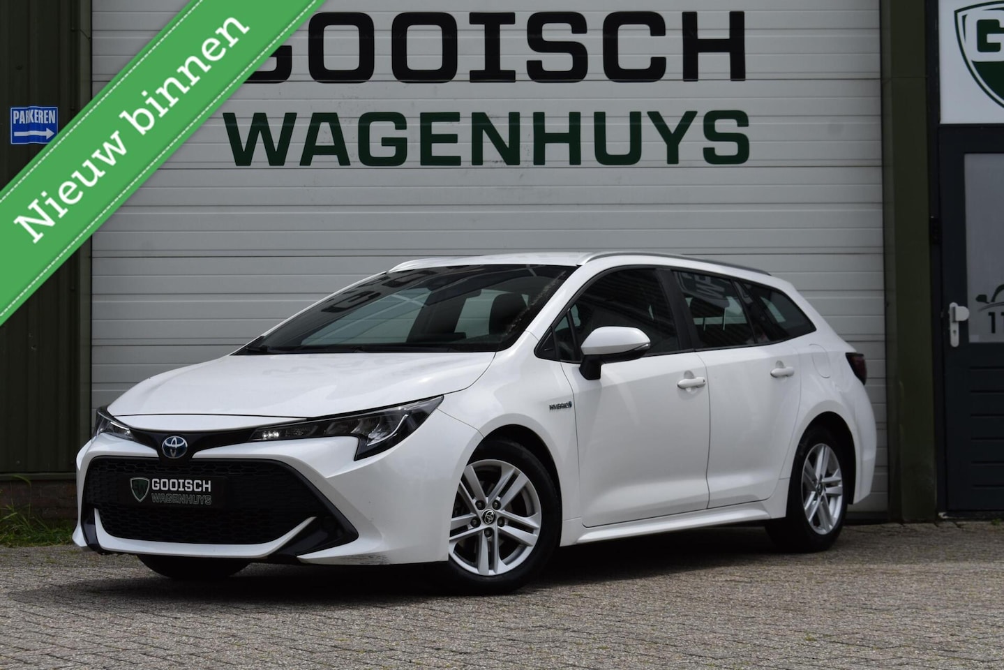 Toyota Corolla Touring Sports - 1.8 Hybrid Active | Navi | Camera | Carplay | - AutoWereld.nl