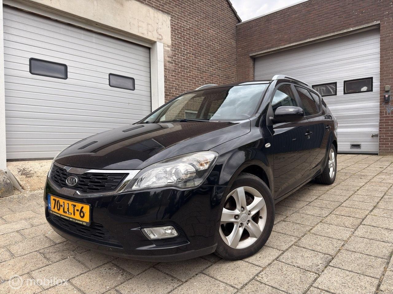 Kia Cee'd Sporty Wagon - 1.4 CVVT X-ecutive 1.4 CVVT X-ecutive - AutoWereld.nl