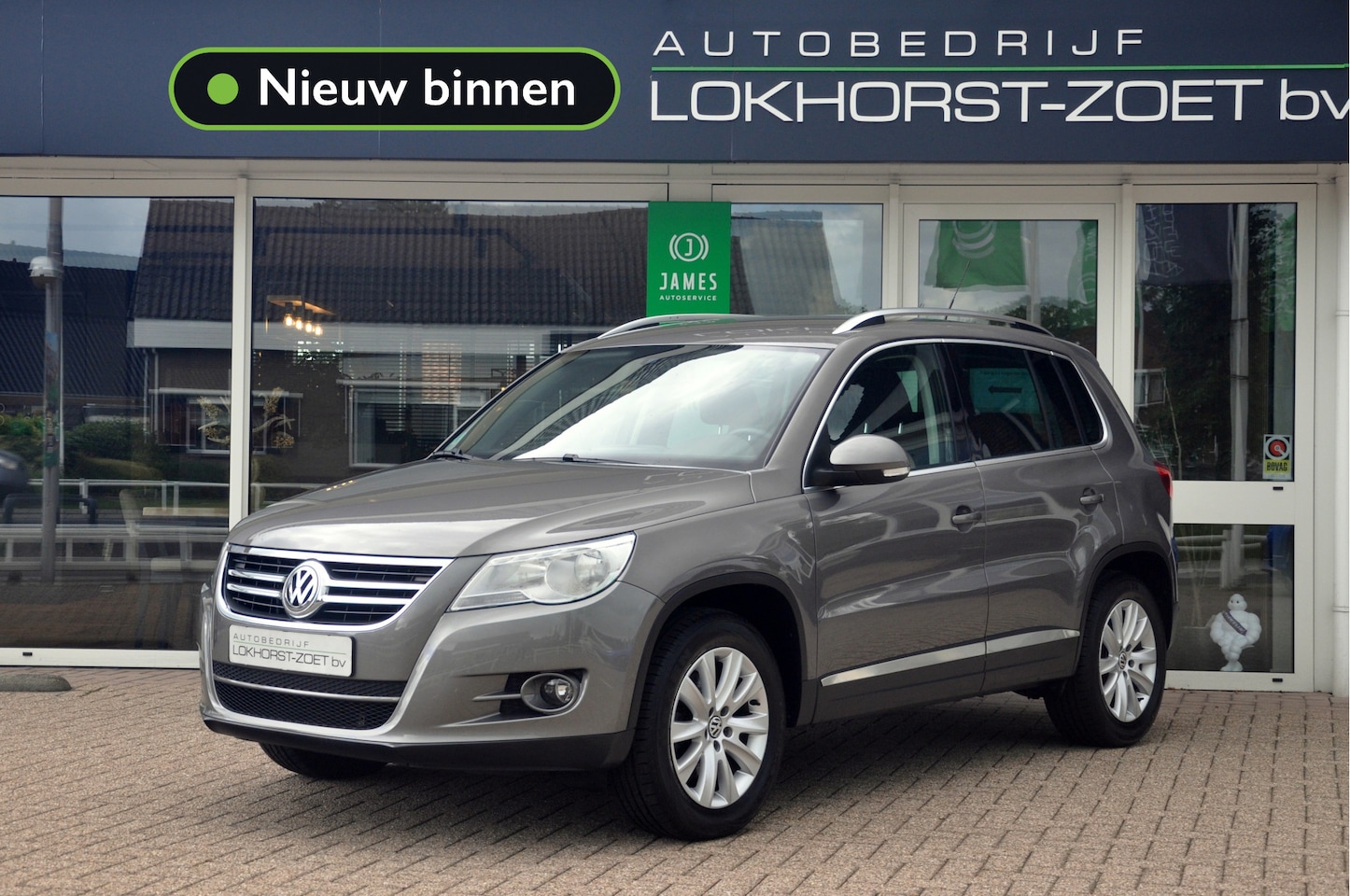 Volkswagen Tiguan - 1.4 TSI 150 PK Sport&Style | Trekhaak | Clima | Cruise | Goed onderhouden! - AutoWereld.nl