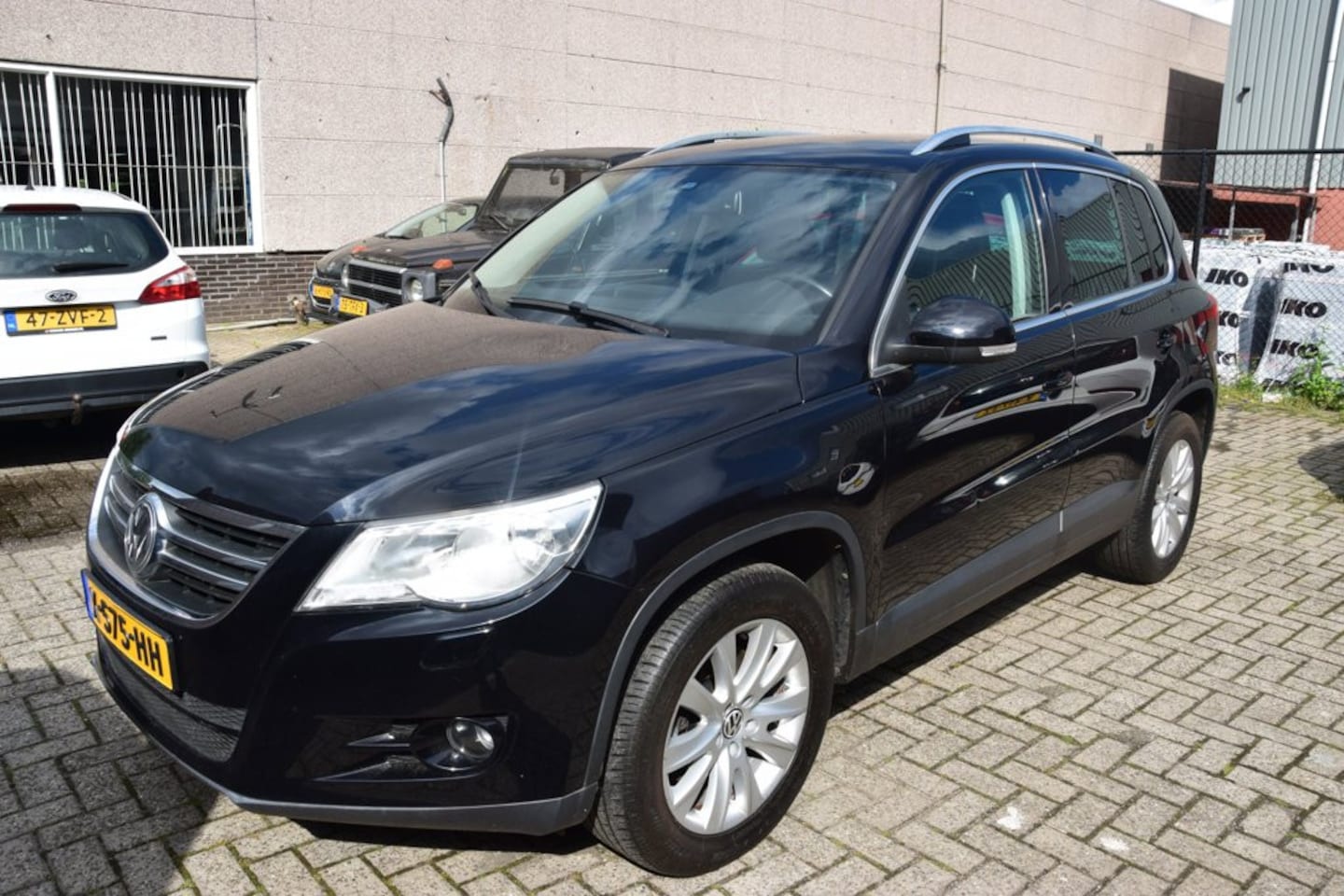 Volkswagen Tiguan - 1.4 TSI Comfort&Design 4Motion,opendak,leer. - AutoWereld.nl