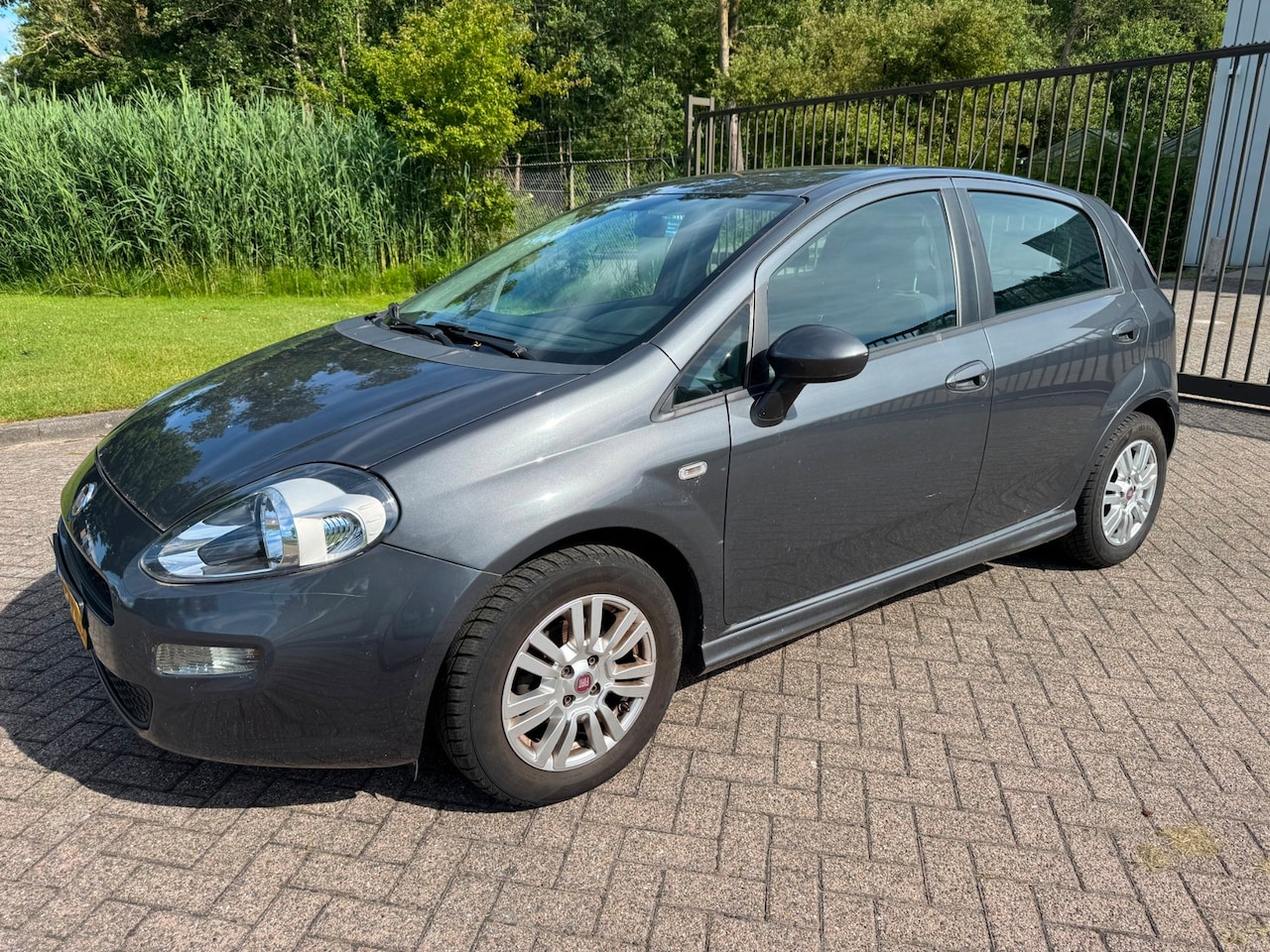 Fiat Punto Evo - 0.9 TwinAir Street AIRCO REGENSENSOR ELEKTRISCHERAMEN - AutoWereld.nl