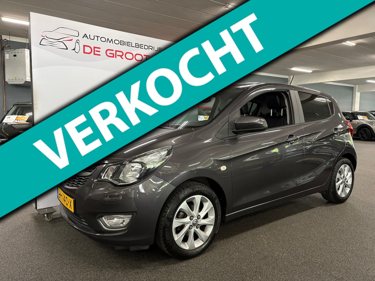 Opel Karl - 1.0 ecoFLEX Cosmo/NL auto/ Lederen bekleding/ Parkeersensoren/ set winterbanden - AutoWereld.nl