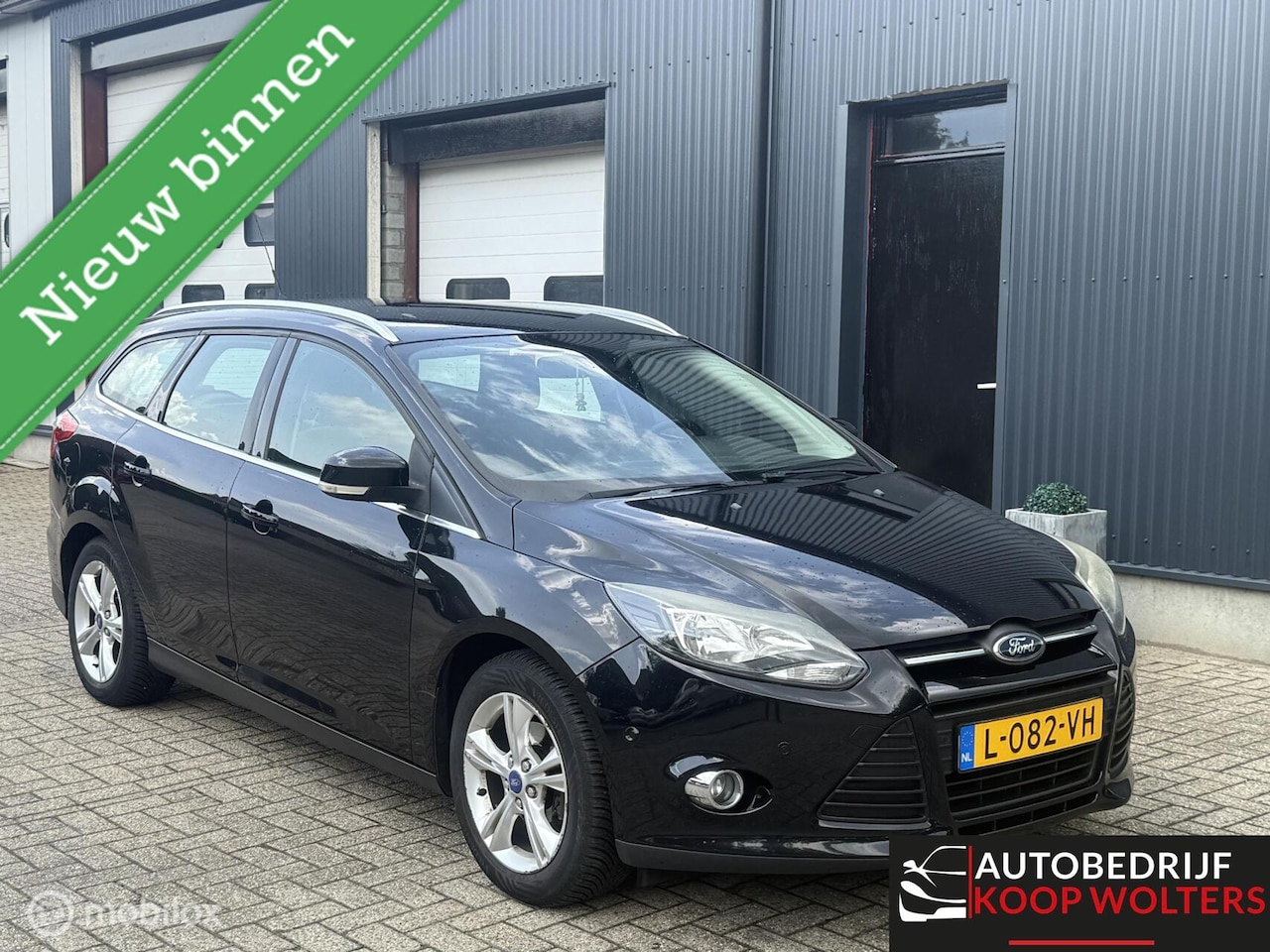 Ford Focus Wagon - 1.0 Titanium Clima PDC - AutoWereld.nl