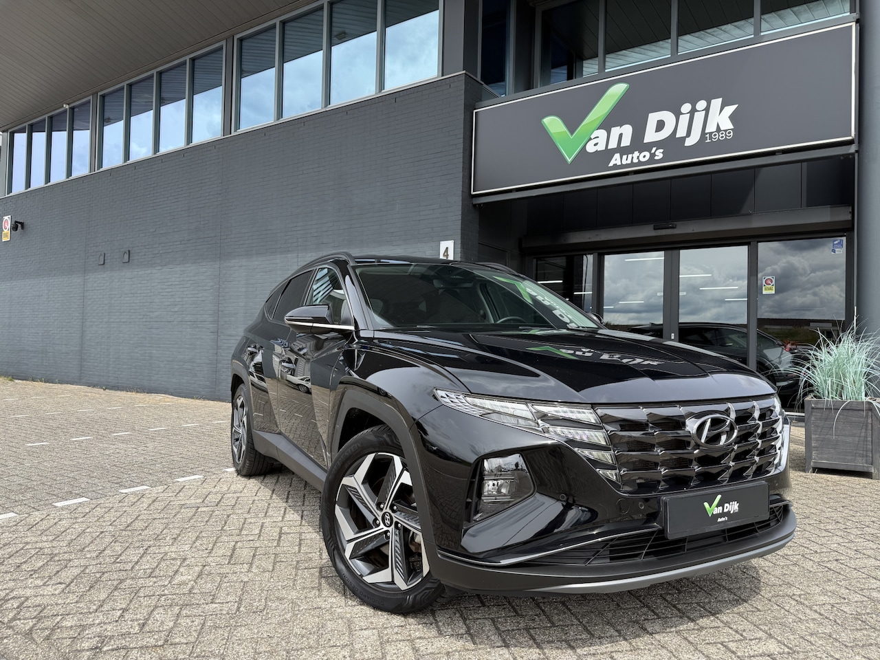 Hyundai Tucson - 1.6 T-GDI PHEV Premium 4WD Navi Camera Leer - AutoWereld.nl