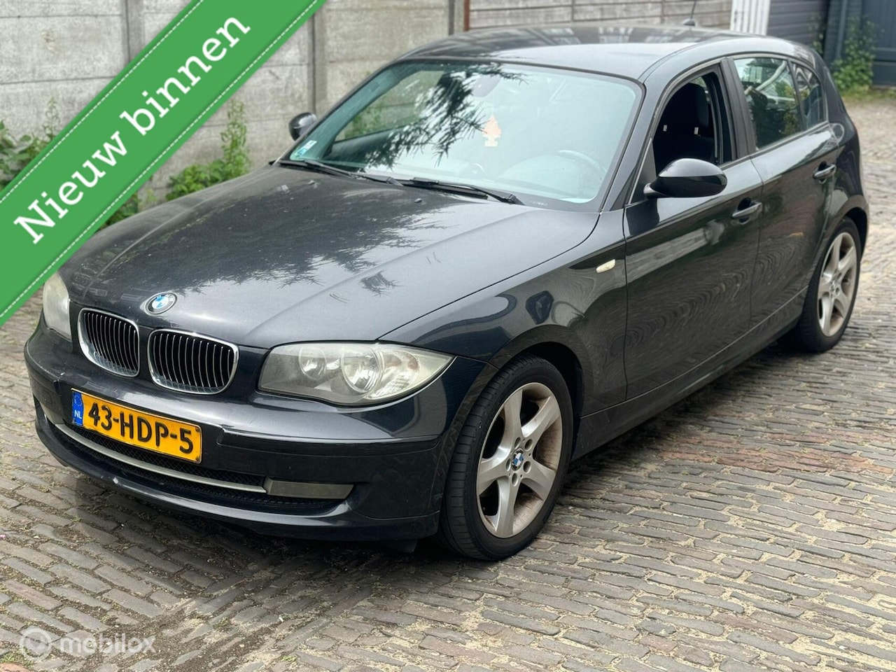 BMW 1-serie - 116i Business Line | APK | NAP | Airco | 5DRS | - AutoWereld.nl