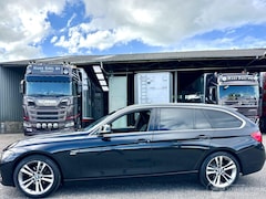 BMW 3-serie Touring - 320d 163pk aut High Executive - nap - alarm - leer - elektr trekh + klep - harman/kardon