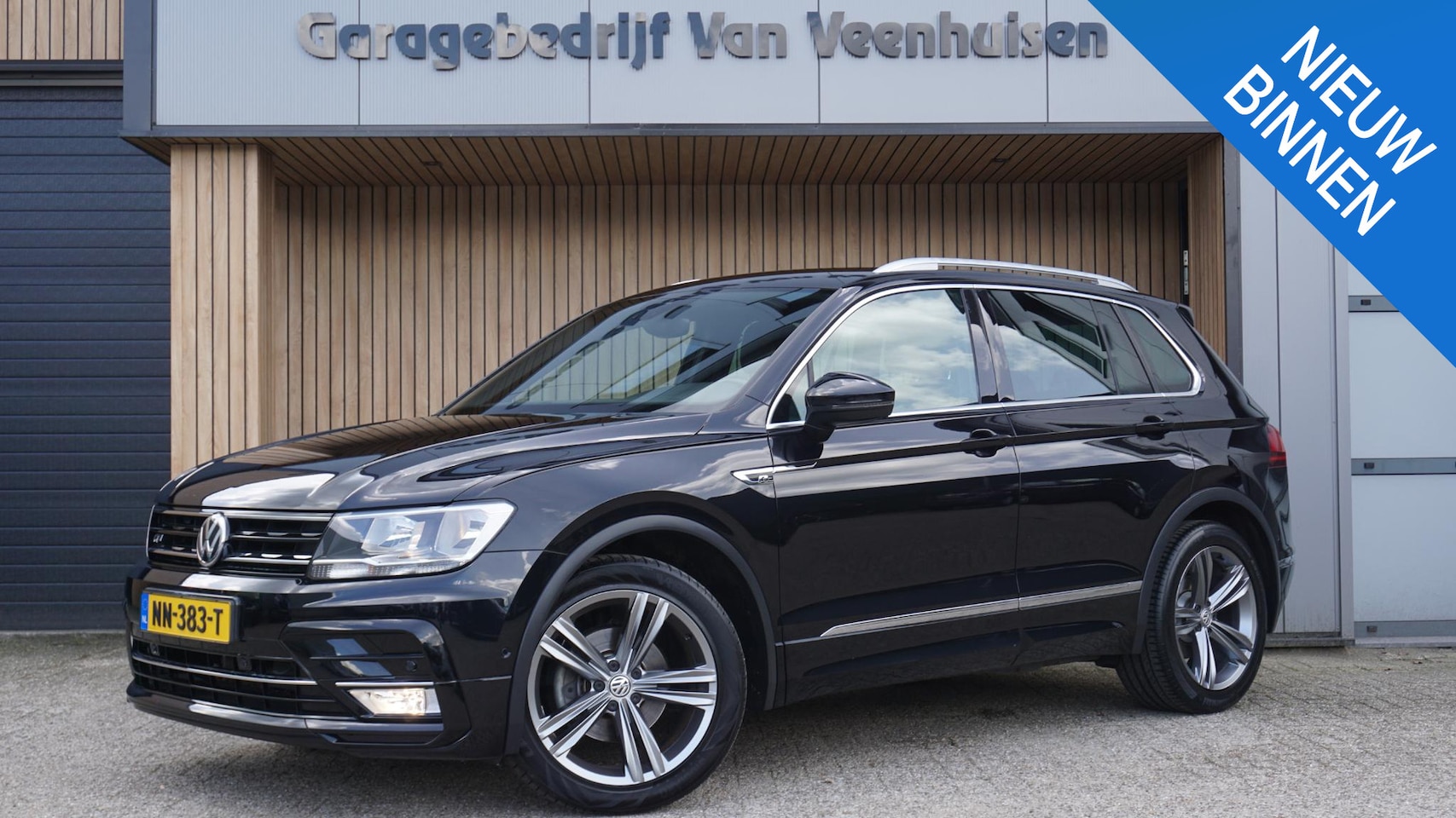 Volkswagen Tiguan - 1.4 TSI 125PK 2x R-Line Navi 19inch LM Trekhaak Cruise Control *NL auto* 105457km! - AutoWereld.nl