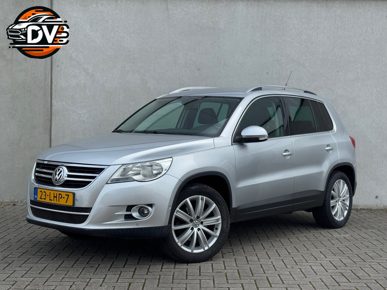 Volkswagen Tiguan - 2.0 TSI Sport&Style 4Motion CRUISE PDC NAV STL VERW - AutoWereld.nl
