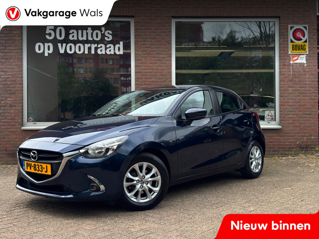 Mazda 2 - 1.5 Skyactiv-G Dynamic | Airco | Navi | PDC | Velgen - AutoWereld.nl