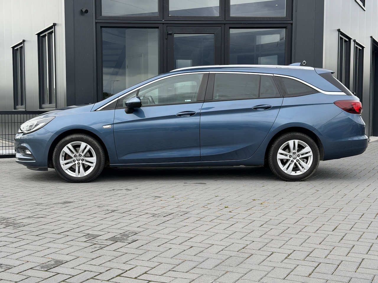 Opel Astra Sports Tourer - 1.0 Bns+ Sportstoel | Climate | Carplay | Cruise - AutoWereld.nl