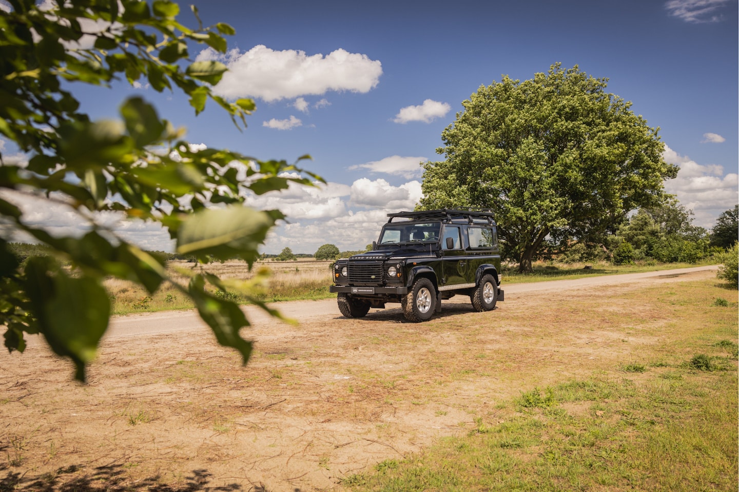 Land Rover Defender - 2.4Tdci Station Wagon Goed onderhouden - AutoWereld.nl