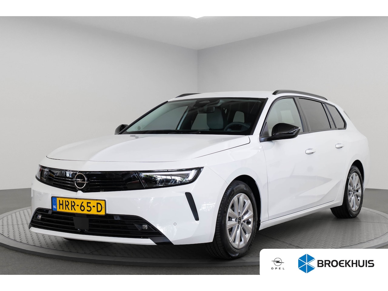 Opel Astra Sports Tourer - 1.2 Business Edition | Tot 8 Jaar Garantie | Camera | Navigatie | Climate Controle | Stoel - AutoWereld.nl
