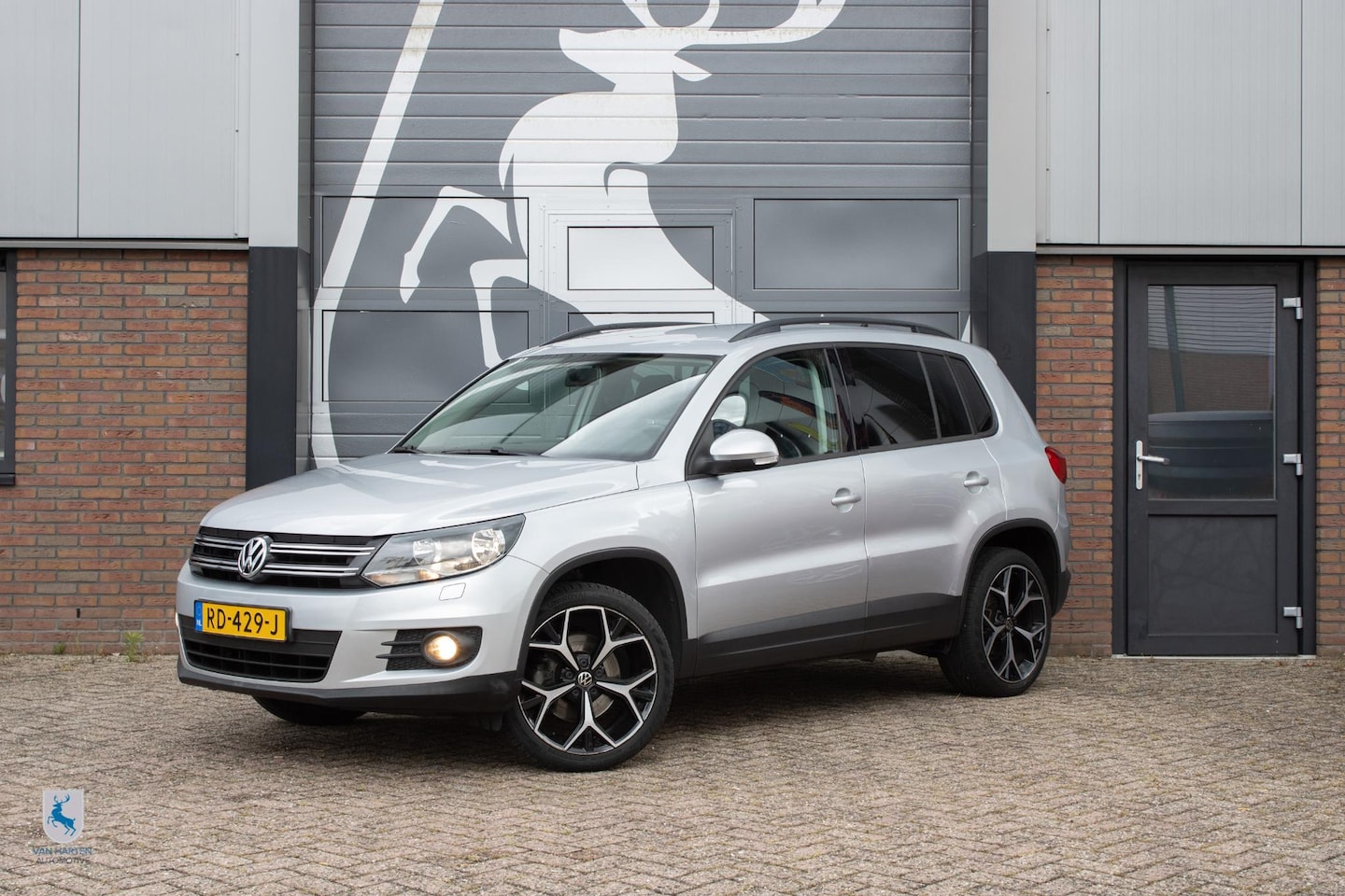 Volkswagen Tiguan - 1.4 TSI Sport&Style - AutoWereld.nl