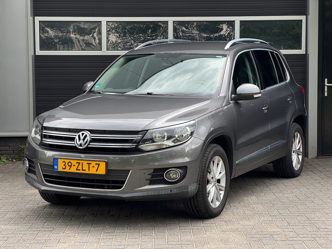 Volkswagen Tiguan - 2.0 TSI Sport&Style 4Motion EXPORT PRIJS - AutoWereld.nl