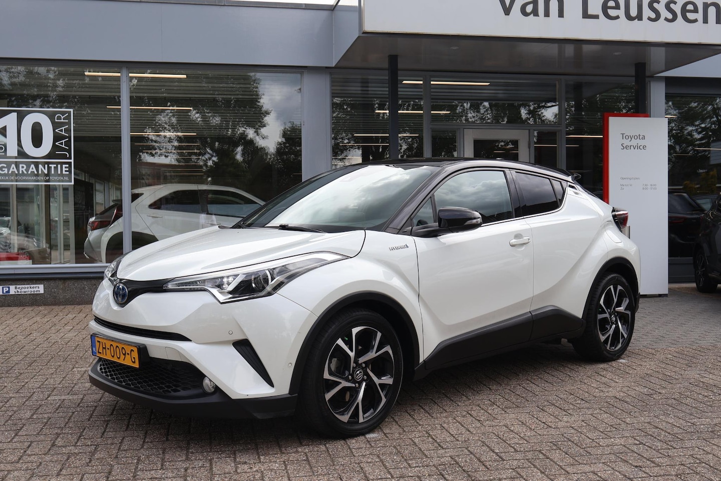 Toyota C-HR - 1.8 HYBRID STYLE BI-TONE DODEHOEK JBL-GELUID STOELVERW. KEYLESS PARK.SENSOREN - AutoWereld.nl