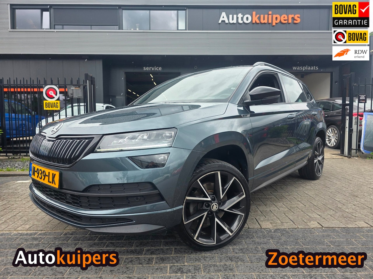 Skoda Karoq - 1.5 TSI ACT Sportline Business | Met o.a. stoelverwarming, digitaal dashboard, navigatie e - AutoWereld.nl